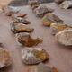 Hundreds of stone hand axes have been recovered from the site. (Image: Israel Antiquities Authority/Samuel Magal)